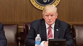 donald trump at conference table