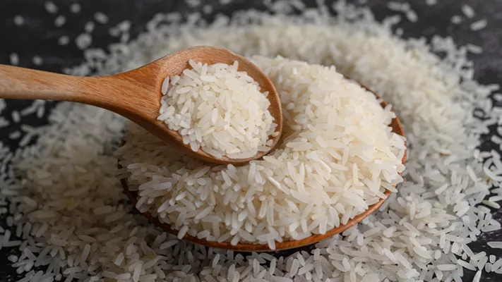 dry rice wooden spoon and bowl.png rice