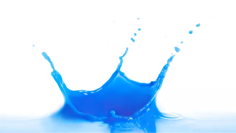 liquid blue splash against white background