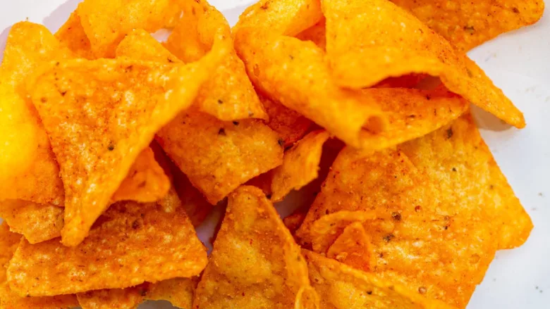 nacho cheese-flavored corn chips