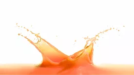 orange-ish pinkish juice splash