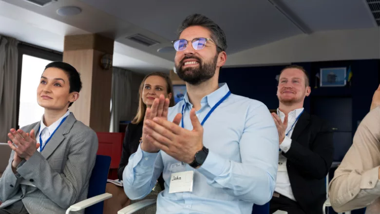 people clapping corporate event