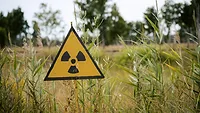 radioactivity sign in a field