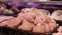 raw chicken breast on display at store