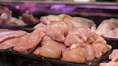 raw chicken breast on display at store