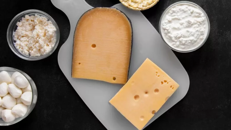top-down view of various cheese dairy products on table