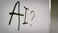 whiteboard that says 'AI'