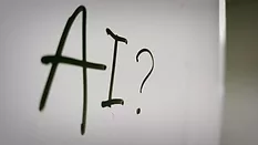 whiteboard that says 'AI'