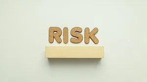cork letters that say RISK_atlascompany via Magnific.png cork letters that say "risk"