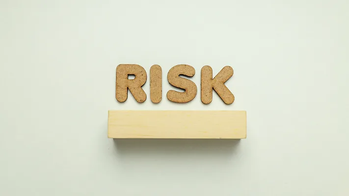 cork letters that say RISK_atlascompany via Magnific.png cork letters that say "risk"
