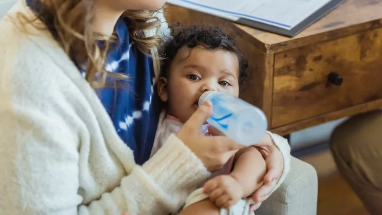 baby taking a bottle