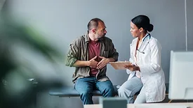doctor talking to patient