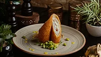 fancy chicken cordon bleu_azerbaijan_stockers via Magnific.png chicken cordon bleu with fancy presentation
