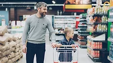father and son grocery shopping