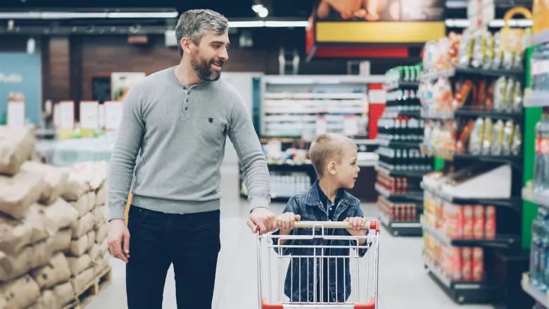 father and son grocery shopping