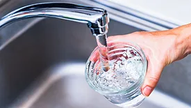 filling cup of water from the sink