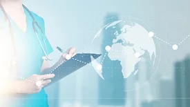 healthcare worker writing on a clipboard with an overlaid image of the globe and a dotted trend line going up