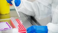 microbiologist performing pathogen testing