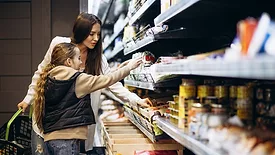 mom and daughter grocery shopping