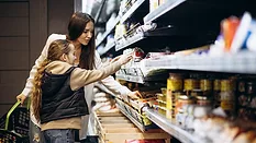 mom and daughter grocery shopping