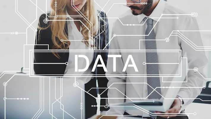 professionals in suits looking at computer with graphic overlay of circuitry and text that says DATA_rawpixel via Freepik.png professionals in suits looking at computer with graphic overlay of circuitry and text that says DATA