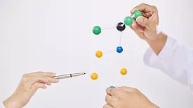 scientists using molecular model