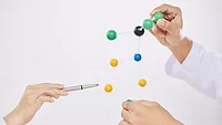 scientists using molecular model