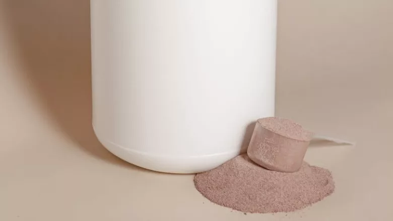 scoop of chocolate protein powder