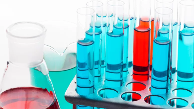test tubes and beakers of colorful liquid