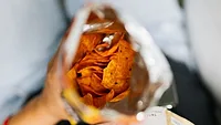 top-down view of open bag of chips