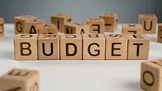 wooden blocks that spell "budget"