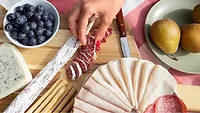 charcuterie with RTE meats_freepik via magnific.png charcuterie board with RTE meats, fruits, and cheeses