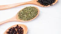 dried spices and herbs on wooden spoons_stockking via magnific.png dried spices and herbs on wooden spoons