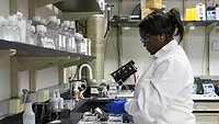 epidemiologist in lab_NCI via undplash.png epidemiologist in lab