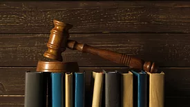 gavel on books wood background