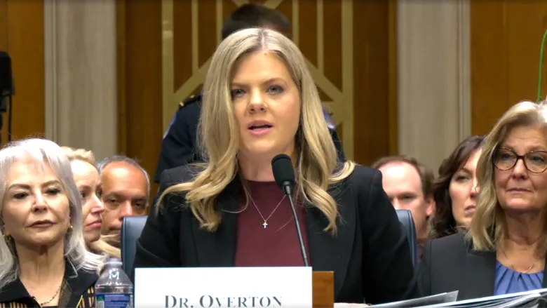 Dr. Heidi Overton speaking at Senate hearing
