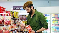 man in market reading food labels_かわい サムライ via pexels.png man in market reading food labels