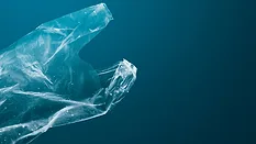 plastic pollution bag floating in water_rawpixel via Magnific.png plastic bag floating in ocean