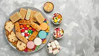 processed chips snacks candies_KamranAydinov via Freepik.png Processed chips snacks and candies
