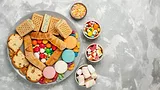 processed chips snacks candies_KamranAydinov via Freepik.png Processed chips snacks and candies