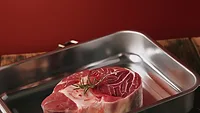raw steak in stainless steel tray_bublikhaus via Magnific.png raw steak in stainless steel tray