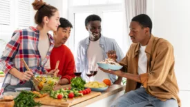 diverse friends eating meal together
