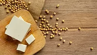 tofu and soybeans on wood table