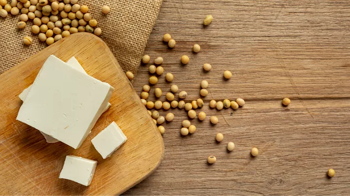 tofu and soybeans on wood table