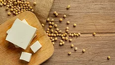 tofu and soybeans on wood table