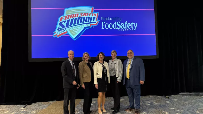town hall panelists on stage at the 2026 food safety summit
