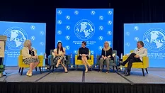 Panelists talking onstage during Outbreaks Lessons Learned Panel at 2025 AFDO AEC