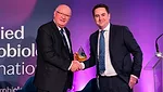 Hygiena rep accepting product of the year award