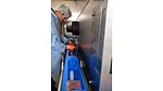 Shade Hughes, FAPC HPP technology manager, loads product into the carrier of the center’s commercial-scale Hiperbaric high pressure processing system
