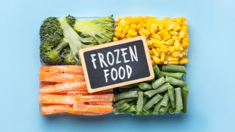 blocks of frozen vegetables with sign that says frozen food